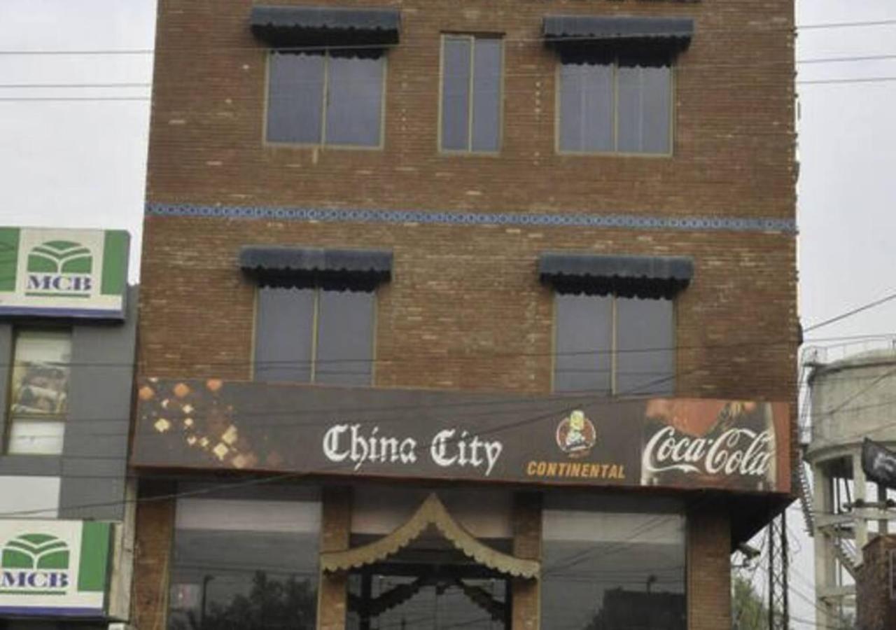 Rajone Hotel Faisalabad Esterno foto
